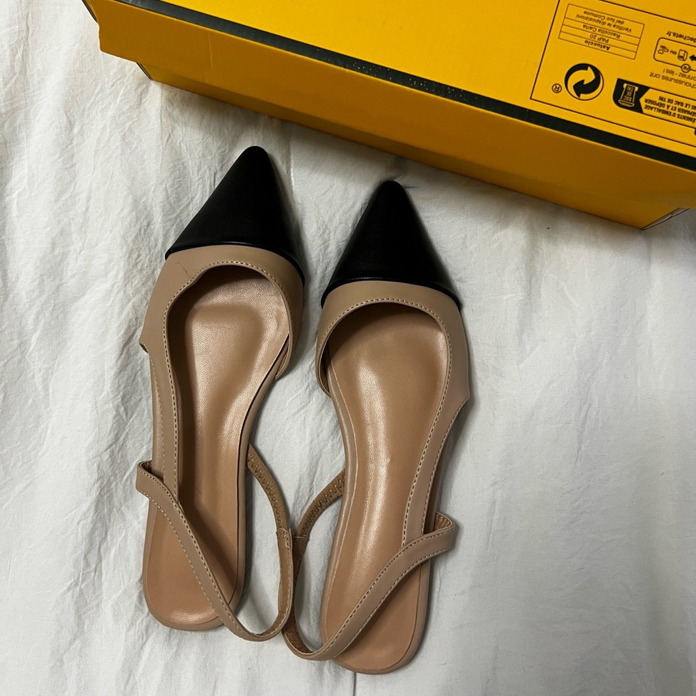Never worn, new with box, size 40